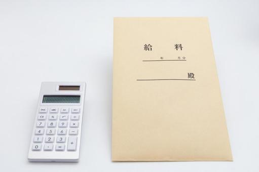 給料袋と電卓 給料袋と電卓 給料袋,電卓,計算の写真素材
