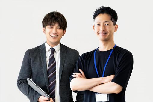 男性2人のビジネスチームワークイメージ 男性2人のビジネスチームワークイメージ 男性,2人,仕事の写真素材