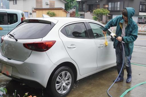 雨の日の洗車06 雨の日の洗車06 洗車,自動車,マイカーの写真素材