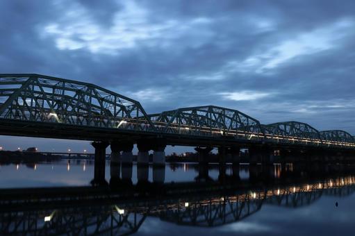 Photo, trajectory of light, truss bridge, water surface, 