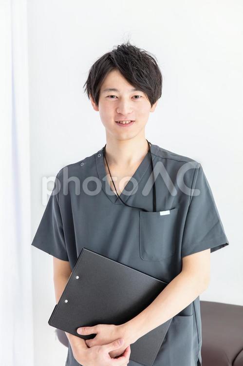 笑顔の整体師　chiropractor 作業療法士,リハビリ,介護士の写真素材