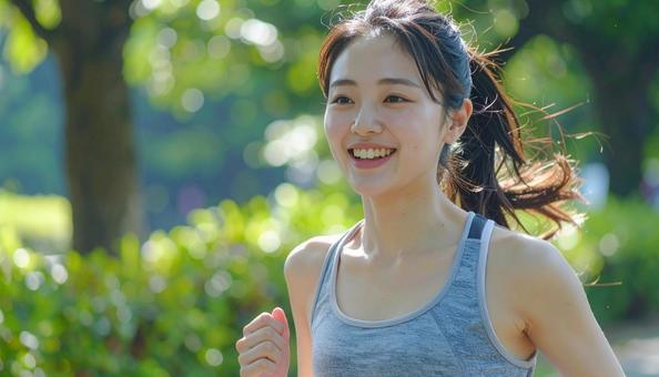 ジョギングする女性 ジョギングする女性の写真