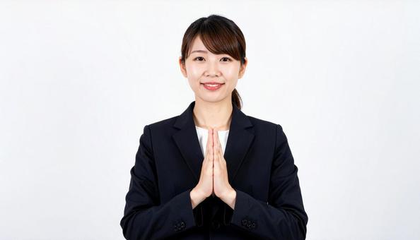 お願いしているビジネスウーマン お願いしているビジネスウーマンの写真
