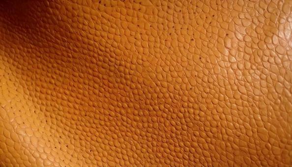 オレンジ色の皮革素材 レザークラフト調 オレンジ色の皮革素材 レザークラフト調の写真