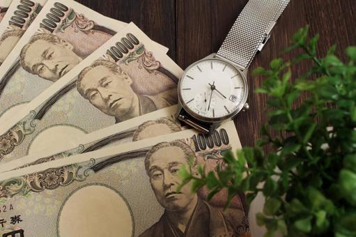 時計と一万円札の組み合わせ 時計,一万円札,日本円の写真素材