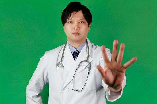 医師のストップサイン 医師のストップサイン 医師,男性,白衣の写真素材