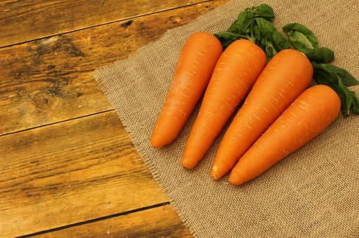 新鮮な人参の束 新鮮な人参の束 人参,野菜,オレンジの写真素材