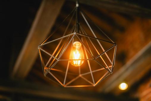 オレンジ色の電球ライト オレンジ色の電球ライト 電球,ライト,照明の写真素材