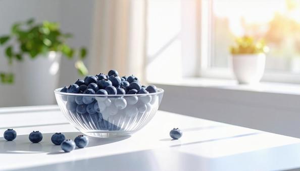 ガラスのボウルに入ったブルーベリーの写真
