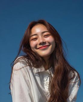 爽やかな表情のアジア人女性 爽やかな表情のアジア人女性の写真