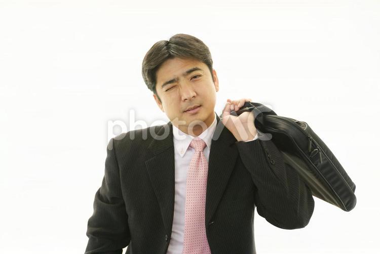 疲れた表情のビジネスマン 男性,ビジネスマン,男の写真素材