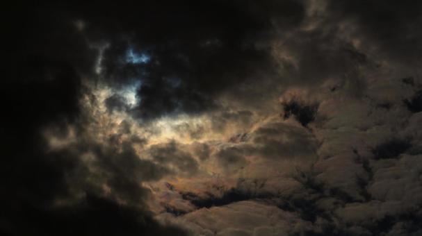 An ominous feeling!? A scary sun between the clouds, JPG