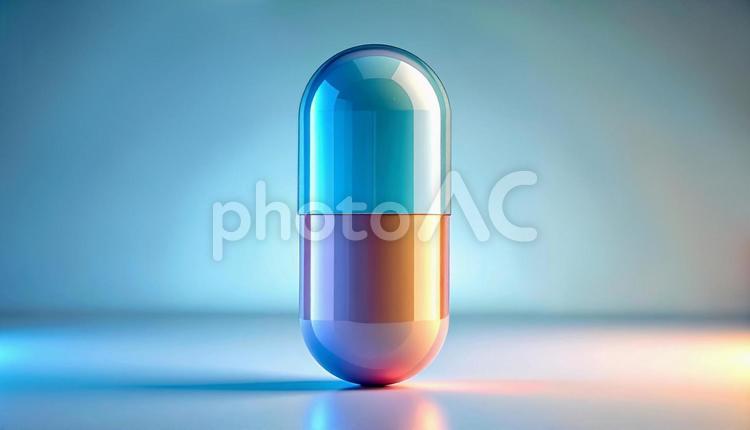薬 カプセルオレンジ水色 薬,カプセル,飲み薬の写真素材