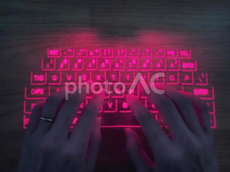 レーザーキーボード3(タイピング) レーザーキーボード,レーザー,キーボードの写真素材