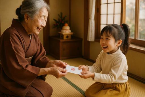 お年玉を受け取る子ども お年玉を受け取る子どもの写真