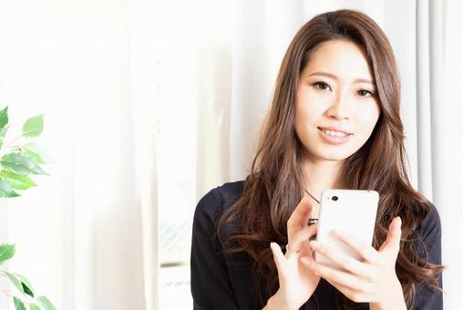Smiling woman smartphone Smiling woman smartphone