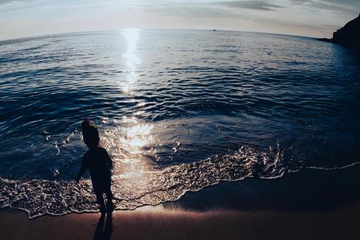 Children playing on the beach, JPG
