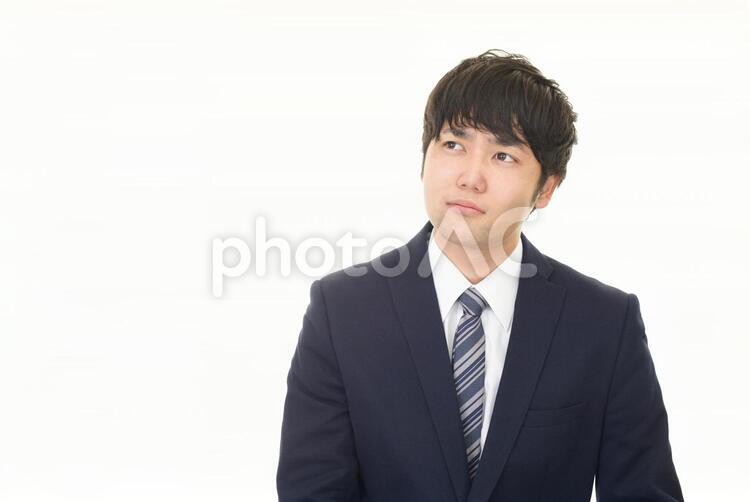 不安そうな表情のビジネスマン 男性,ビジネスマン,男の写真素材