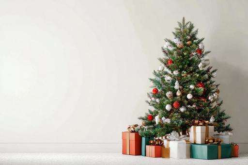 プレゼントが置いているクリスマスツリー プレゼントが置いているクリスマスツリーの写真