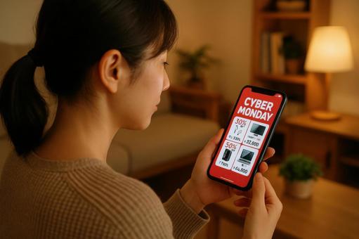スマホでセール確認女性 スマホでセール確認女性の写真