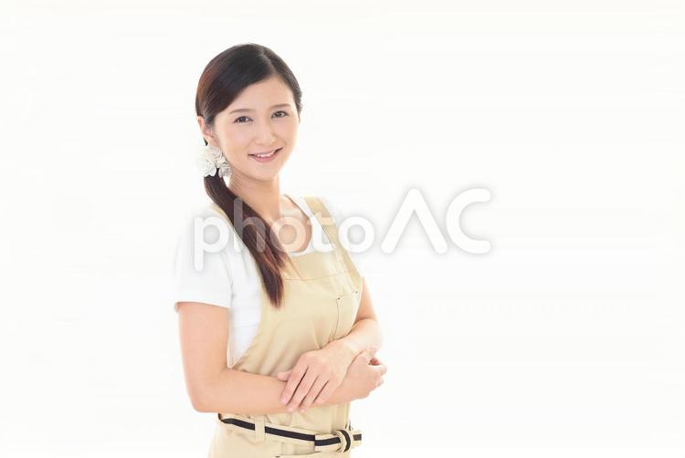 笑顔のエプロン姿の女性 主婦,ママ,お母さんの写真素材