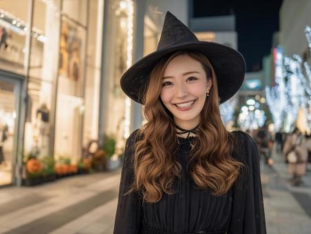 ハロウィンパーティ、魔女コスプレ女性 ハロウィンパーティ、魔女コスプレ女性の写真