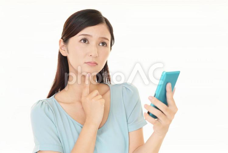 スマーとフォンを持つ女性 女性,スマホ,スマートフォンの写真素材