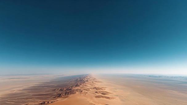 荒涼とした大地と青い空 荒涼とした大地と青い空の写真