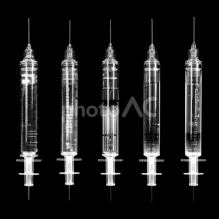 医療研究と健康を象徴する注射器の列 注射器,シリンジ,針の写真素材