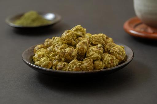 Matcha popcorn on a simple black background, JPG
