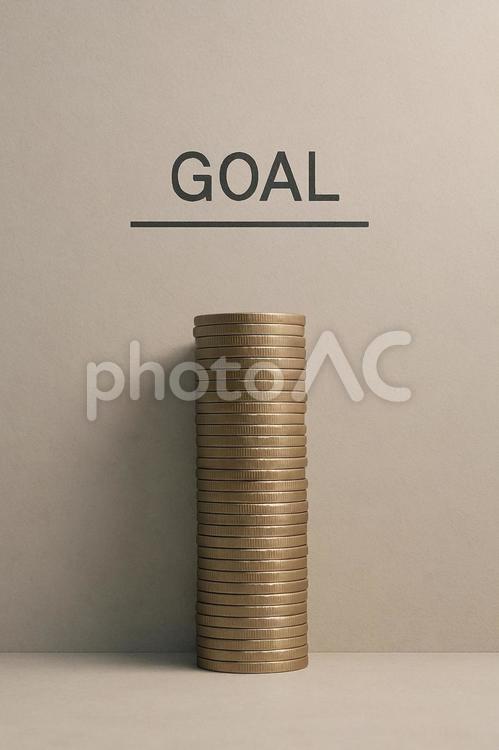 目標達成の象徴（積み上がる硬貨） 硬貨,コイン,通貨の写真素材