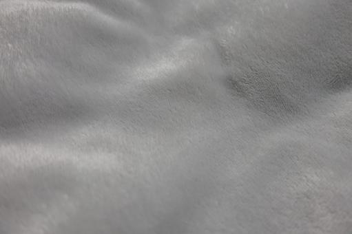 柔らかな光沢のあるグレーのテクスチャ写真 布,生地,テキスタイルの写真素材