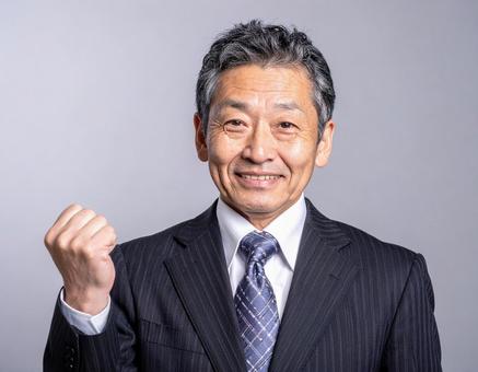 ガッツポーズのビジネスマン ガッツポーズのビジネスマンの写真