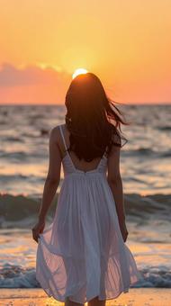 夕焼けを見る少女 夕焼けを見る少女の写真