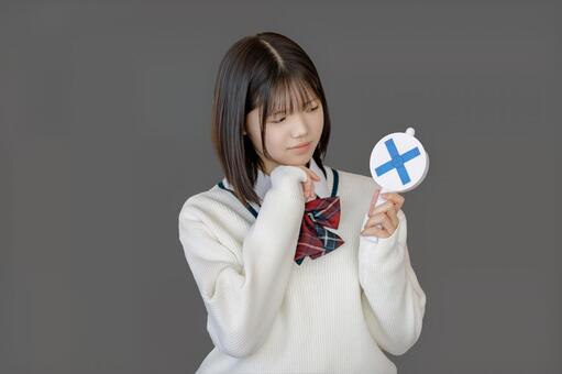 悩む学生 女子学生,学生,制服の写真素材