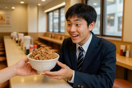 牛丼特盛を注文した学生 牛丼特盛を注文した学生の写真