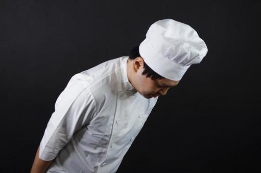 お辞儀をするシェフ お辞儀をするシェフの写真