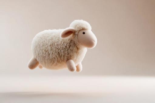 空に浮かぶぬいぐるみ羊の写真
