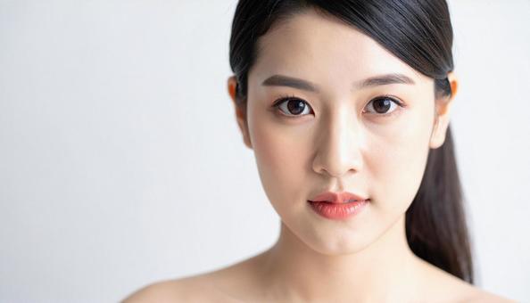 アジアの若い女性の美しい肌と表情のアップ アジアの若い女性の美しい肌と表情のアップの写真