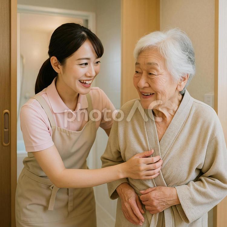介護をする女性スタッフ 介護,高齢者,スタッフの写真素材