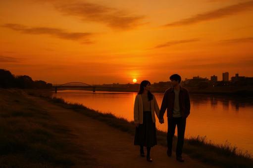 夕暮れの河川敷デート 夕暮れの河川敷デートの写真