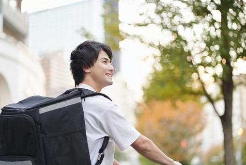 Asian man delivering food Asian man delivering food