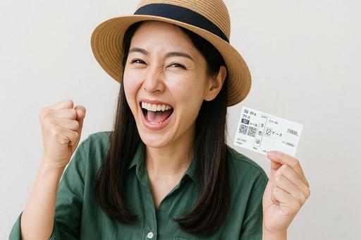 馬券を握りしめている女性・ギャンブル 馬券を握りしめている女性・ギャンブルの写真