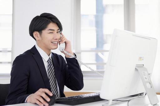 Japanese male businessman answering the phone with a smile, business, office, businessman, JPG