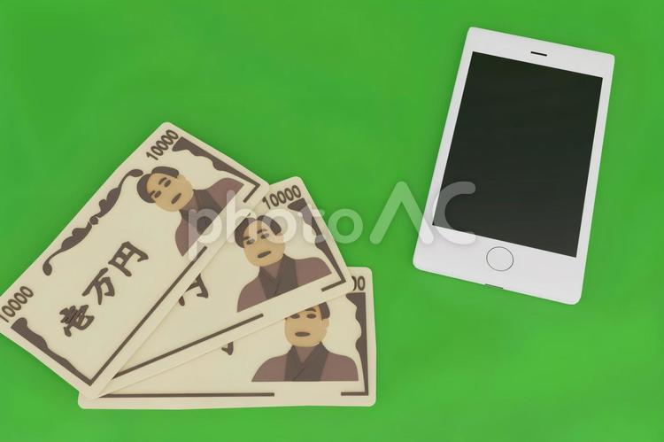 一万円札とスマホのクレイアート スマホ,スマートフォン,アイフォーンの写真素材