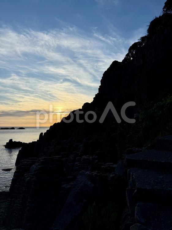 福井県鉾島　越前海岸の夕方の空 断崖絶壁,水平線,夕景の写真素材