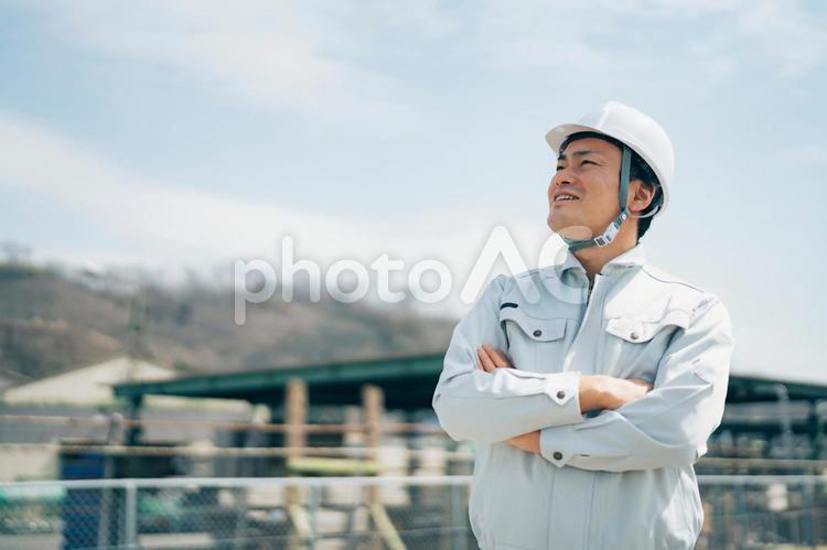 足場工事・建築業・作業着を着た男性 足場職人,解体業,鳶職人の写真素材
