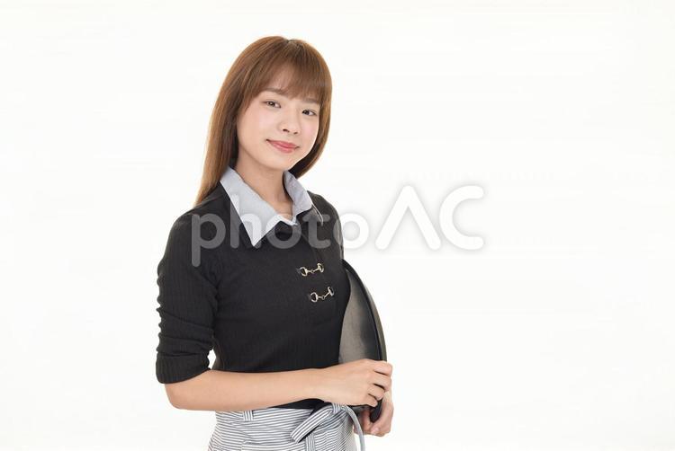 エプロン姿の女性　飲食店スタッフ エプロン,ウェイトレス,レストランの写真素材