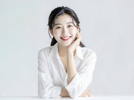 頬杖をつく若い日本人女性 AI生成画像 頬杖をつく若い日本人女性 AI生成画像の写真