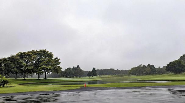 雨のゴルフ 雨のゴルフ 雨,接待,練習の写真素材